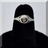 J006. 14K white gold filigree and diamond ring size 4 - $95